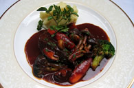 Beef (cheek) cooked in red wine with mashed potatoes